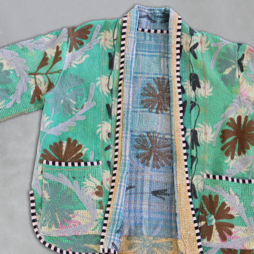 Mint floral-patterned Kantha Jacket  with a textured border on a grey background,by Colourstory
