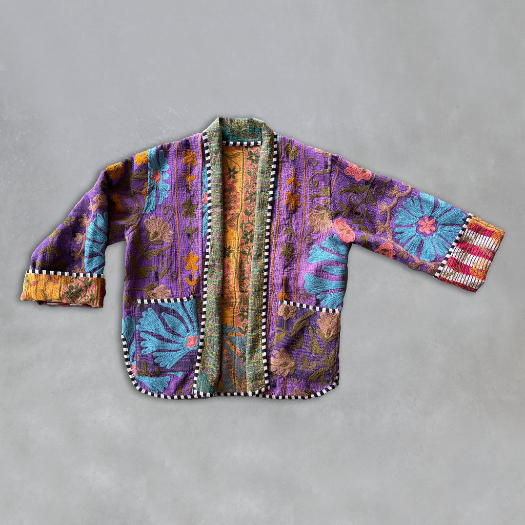 Colourful embroidery Kantha jacket on a grey, by Colourstory.